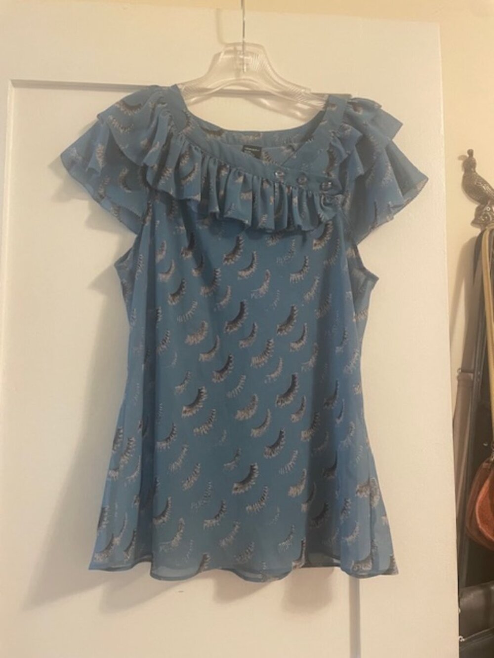 Eyelash-patterned sheer blouse